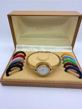 Gucci Gold Women's Interchangeable Bezel Bangle Watch with Colorful Bezels